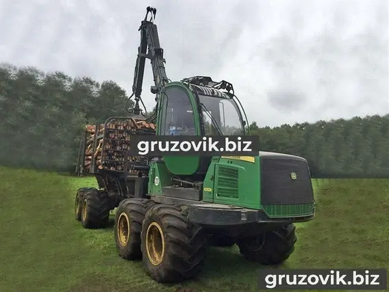 Лесовоз с КМУ John Deere 1010E 2009 года б/у фото 5