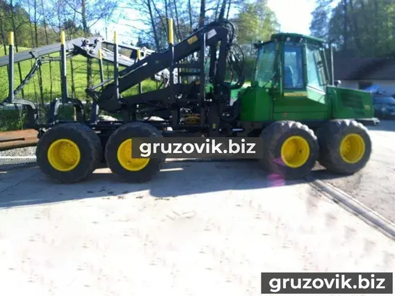 Лесовоз с КМУ John Deere 1110D 2007 года б/у фото 4