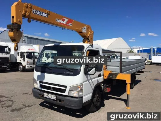 Самопогрузчик Mitsubishi Fuso Canter 2012 года б/у фото 7