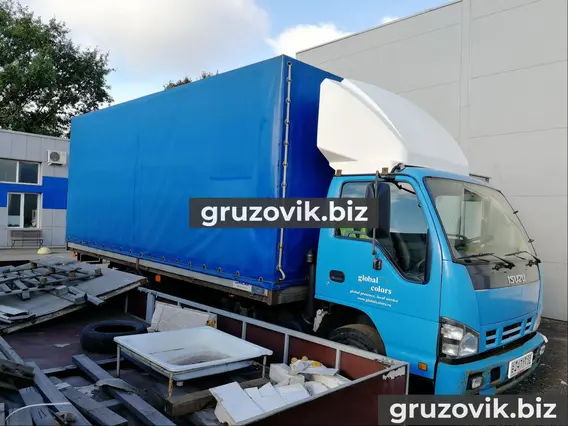 Тентованный грузовик Isuzu NPR75 2008 года б/у фото 3