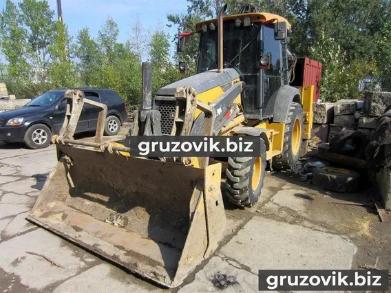 Экскаватор-погрузчик John Deere 325J 2012 года б/у