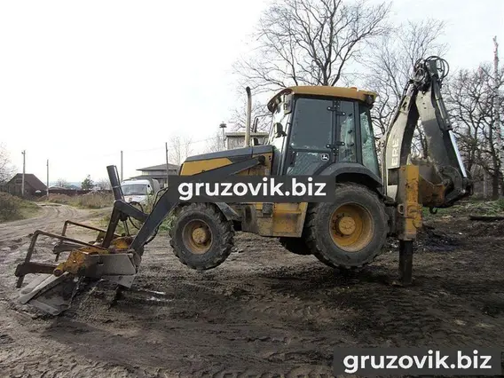 Экскаватор-погрузчик John Deere 325J 2011 года новый фото 5