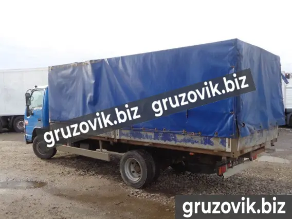 Тентованный грузовик Isuzu NQR 75P 2009 года б/у фото 7