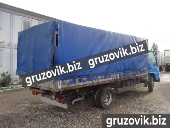Тентованный грузовик Isuzu NQR 75P 2009 года б/у фото 8