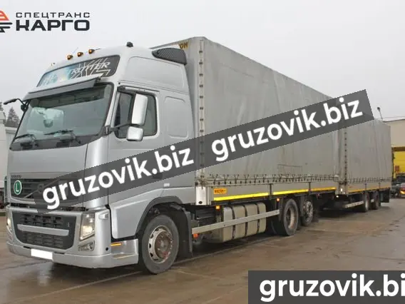 Тентованный грузовик Volvo FM 2011 года б/у фото 2