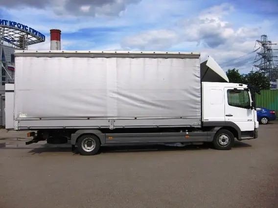 Тентованный грузовик Mercedes-Benz Atego 818 2010 года б/у фото 4