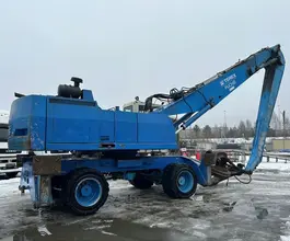 Грейферный погрузчик FUCHS MHL 360 2002 года б/у фото 4