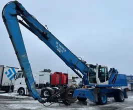 Грейферный погрузчик FUCHS MHL 360 2002 года б/у