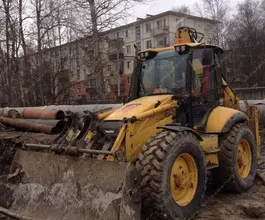 Экскаватор-погрузчик Komatsu WB97 2011 года б/у