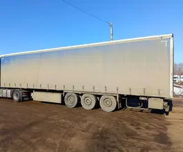 Тентованный полуприцеп Krone SDP27 2023 года б/у фото 4