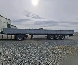 Бортовой полуприцеп МАЗ 975800 2012 года б/у