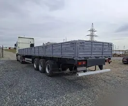 Бортовой полуприцеп МАЗ 975800 2012 года б/у фото 4