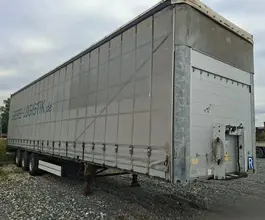 Тентованный полуприцеп Schmitz Cargobull S01 2011 года б/у