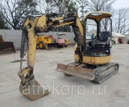 Экскаватор Caterpillar 303  б/у