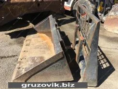 Фронтальный погрузчик Caterpillar 242 2012 года б/у