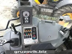Экскаватор-погрузчик Komatsu WB93 2011 года б/у