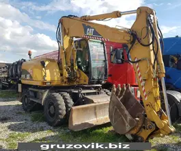 Экскаватор Caterpillar M313 2006 года б/у