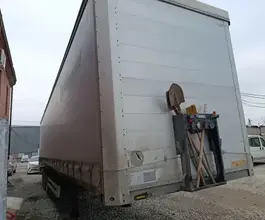 Тентованный прицеп Grunwald 9453 2023 года б/у
