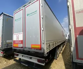 Грузовой полуприцеп общего назначения GRUNWALD 9453 2023 года б/у фото 4