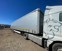 Тентованный полуприцеп Krone SD 2022 года б/у