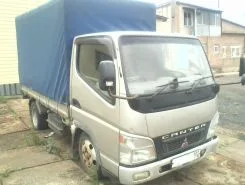 Тентованный грузовик Тентованный грузовик  Mitsubishi 2003 года б/у