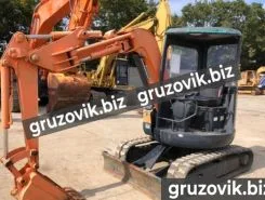 Экскаватор-погрузчик Hitachi EX30 2002 года б/у