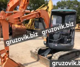 Экскаватор-погрузчик Hitachi EX30 2002 года б/у