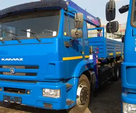 Самопогрузчик Камаз 65117 с КМУ DongYang 2025 года новый