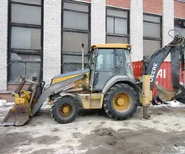 Экскаватор-погрузчик John Deere 325J 2012 года б/у