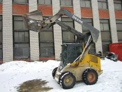 Фронтальный погрузчик John Deere 328 D 2010 года б/у