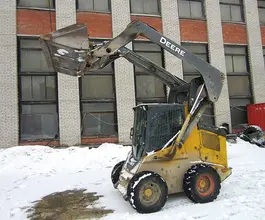 Фронтальный погрузчик John Deere 328 D 2010 года б/у