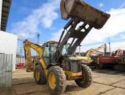 Экскаватор-погрузчик Caterpillar 444E 2006 года б/у