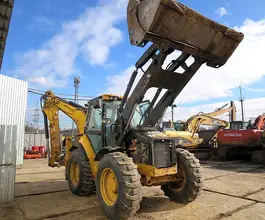 Экскаватор-погрузчик Caterpillar 444E 2006 года б/у