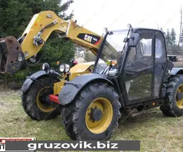 Телескопический погрузчик Caterpillar TH336 2009 года б/у
