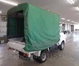 Тентованный грузовик Тентованный грузовик  Nissan 2010 года б/у фото 2