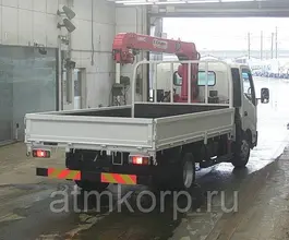 Самопогрузчик Toyota Dyna с КМУ UNIC 294 2012 года б/у фото 2