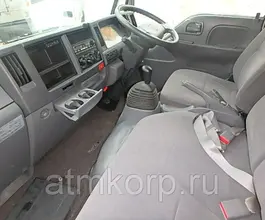 Тентованный грузовик Тентованный грузовик  Nissan 2011 года б/у фото 4