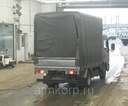 Тентованный грузовик Тентованный грузовик  Nissan 2010 года б/у фото 4