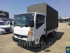 Тентованный грузовик Тентованный грузовик  Nissan 2010 года б/у фото 2