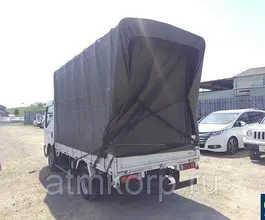 Тентованный грузовик Тентованный грузовик  Nissan 2010 года б/у фото 3