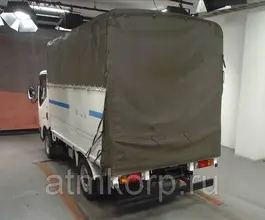 Тентованный грузовик Тентованный грузовик  Nissan 2011 года б/у фото 3