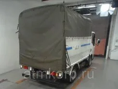 Тентованный грузовик Тентованный грузовик  Nissan 2011 года б/у фото 4