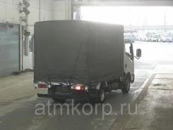 Тентованный грузовик Тентованный грузовик  Nissan 2011 года б/у фото 2