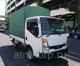 Тентованный грузовик Тентованный грузовик  Nissan 2010 года б/у