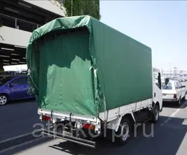 Тентованный грузовик Тентованный грузовик  Nissan 2010 года б/у фото 4