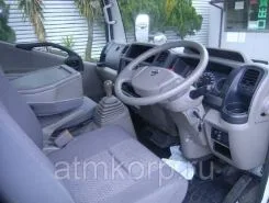 Тентованный грузовик Тентованный грузовик  Nissan 2010 года б/у фото 4