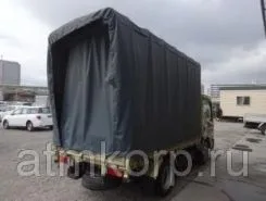 Тентованный грузовик Тентованный грузовик  Nissan 2012 года б/у фото 2