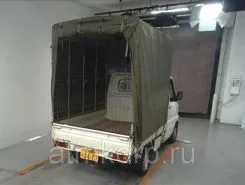 Тентованный грузовик Тентованный грузовик  Nissan 2010 года б/у фото 4