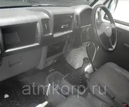 Тентованный грузовик Тентованный грузовик  Nissan 2010 года б/у фото 5
