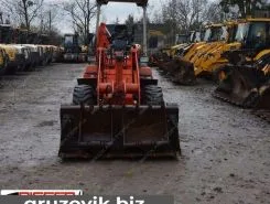 Экскаватор-погрузчик Kubota R420 2005 года б/у фото 2